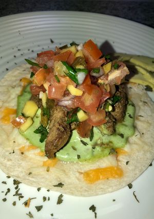 Una foto de Pico de Gallo Con Mango