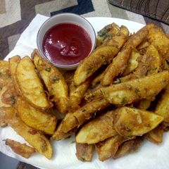 A picture of Potato wedges.