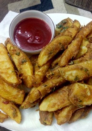 A picture of Potato wedges.