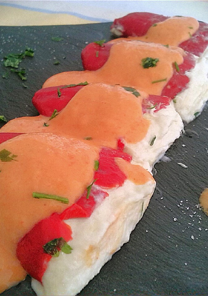 Una foto de Piquillos rellenos de brandada de bacalao