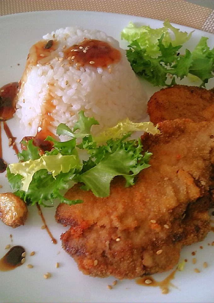 Una foto de Escalope de ternera con guarnición de arroz