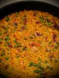 Arroz con zamburiñas y langostinos al horno