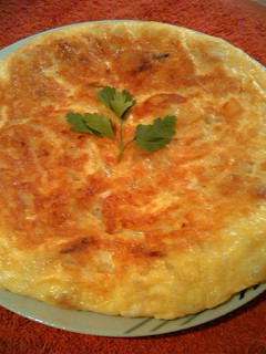 Una foto de Tortilla de Patatas, Calabacín y Champiñones
