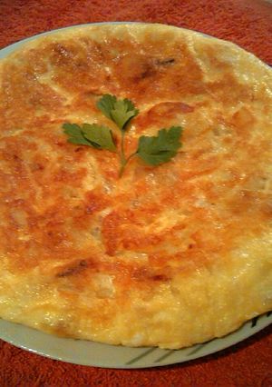 Una foto de Tortilla de Patatas, Calabacín y Champiñones