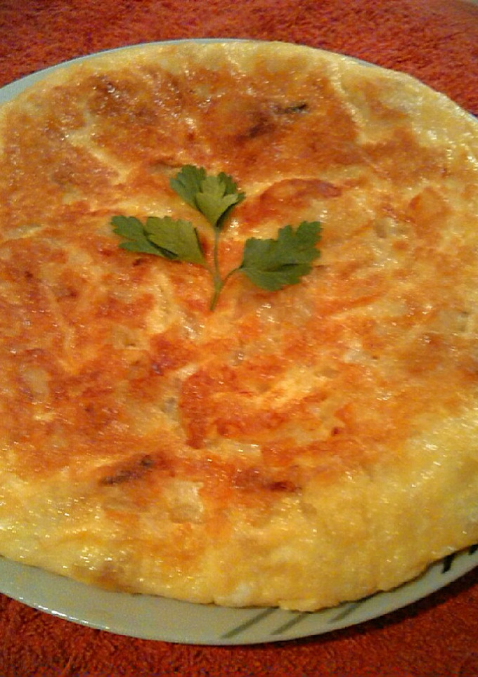 Una foto de Tortilla de Patatas, Calabacín y Champiñones