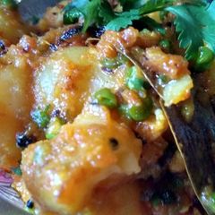 A picture of Malai aaloo dum.