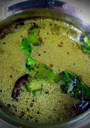 A picture of Betel Leaves Rasam (Soup).