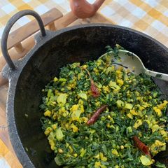 Muli ka saag stir fried with besan (Radish greens with Gram flour) A picture of Muli ka saag stir fried with besan (Radish greens with Gram flour).