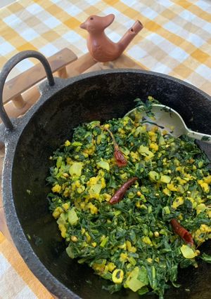 A picture of Muli ka saag stir fried with besan (Radish greens with Gram flour).