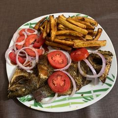 Roasted fish and plantain A picture of Roasted fish and plantain.