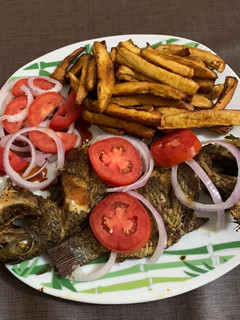 A picture of Roasted fish and plantain.