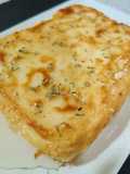 Feta saganaki con sirope y romero
