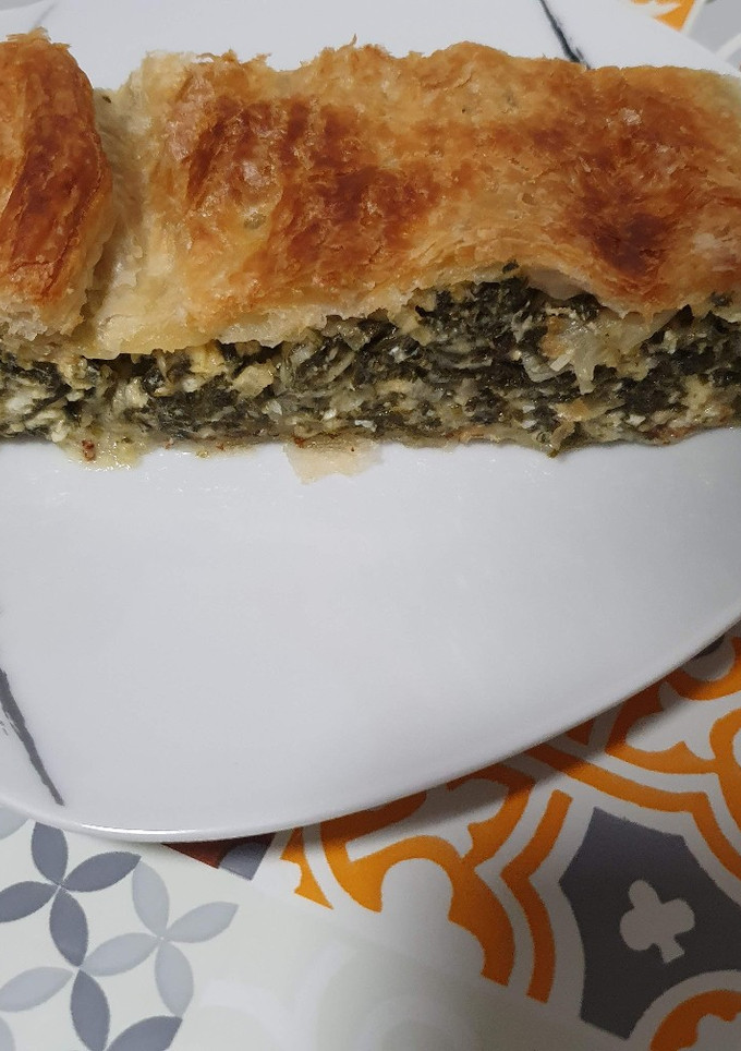 Una foto de Hojaldre relleno de acelgas y huevo