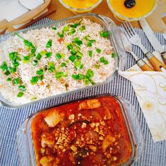 A picture of Kung Pao Chicken serve with Vegetable Fried Rice & Mango Custard.