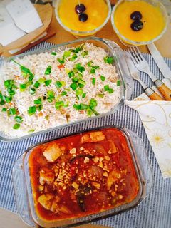 A picture of Kung Pao Chicken serve with Vegetable Fried Rice & Mango Custard.