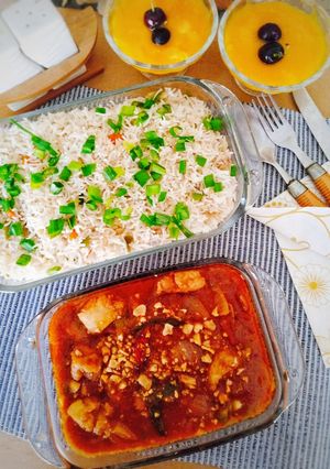 A picture of Kung Pao Chicken serve with Vegetable Fried Rice & Mango Custard.