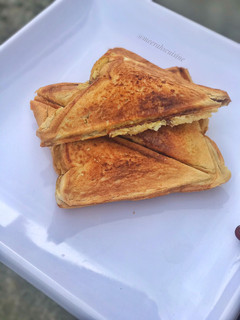 A picture of Egg and sardine toasted bread.