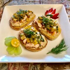 A picture of Meyers lemon 🍋 Dill relish On top of hummus Toast.