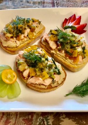 A picture of Meyers lemon 🍋 Dill relish On top of hummus Toast.