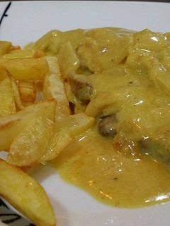 Una foto de Filetes al Curry