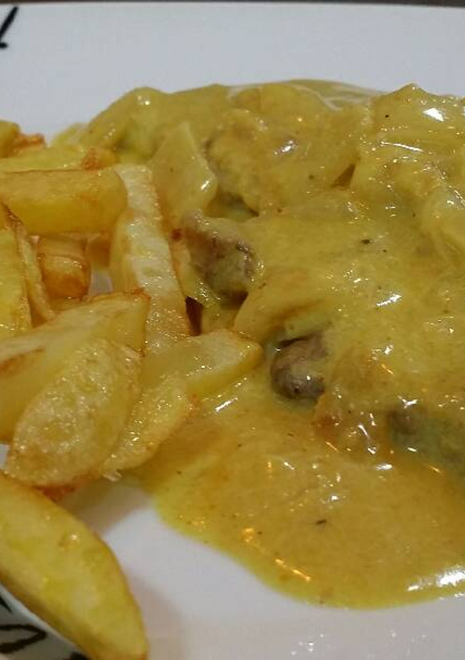 Una foto de Filetes al Curry