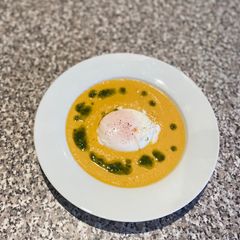 A picture of Asian style butternut squash and sesame oil soup.