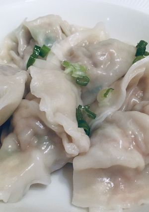 A picture of Homemade pork and cabbage dumpling 🥟.