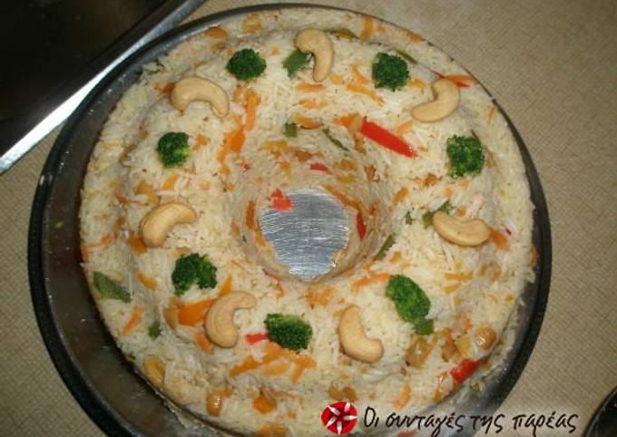 κύρια φωτογραφία συνταγής Ρύζι με κοτόπουλο, πιπεριές και κάσιους