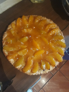 Una foto de Kuchen de duraznos 🍑