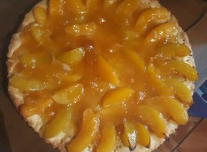 Una foto de Kuchen de duraznos 🍑