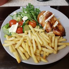 A picture of My Roast Breast of Chicken with Melted brié. With Chips & Salad.