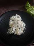 Tortelloni with bechamel sauce