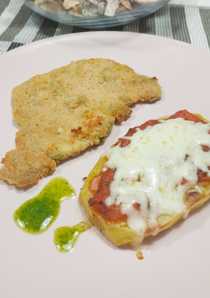 Una foto de Milanesas con pizzetas de papas