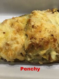 Una foto de Berenjenas con atún, huevo duro y 5 clases de queso