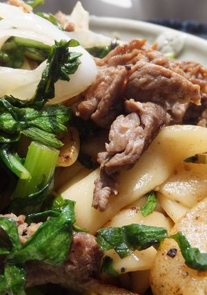 A picture of Yaki Udon with Kishimen Noodles and Chrysanthemum Greens.