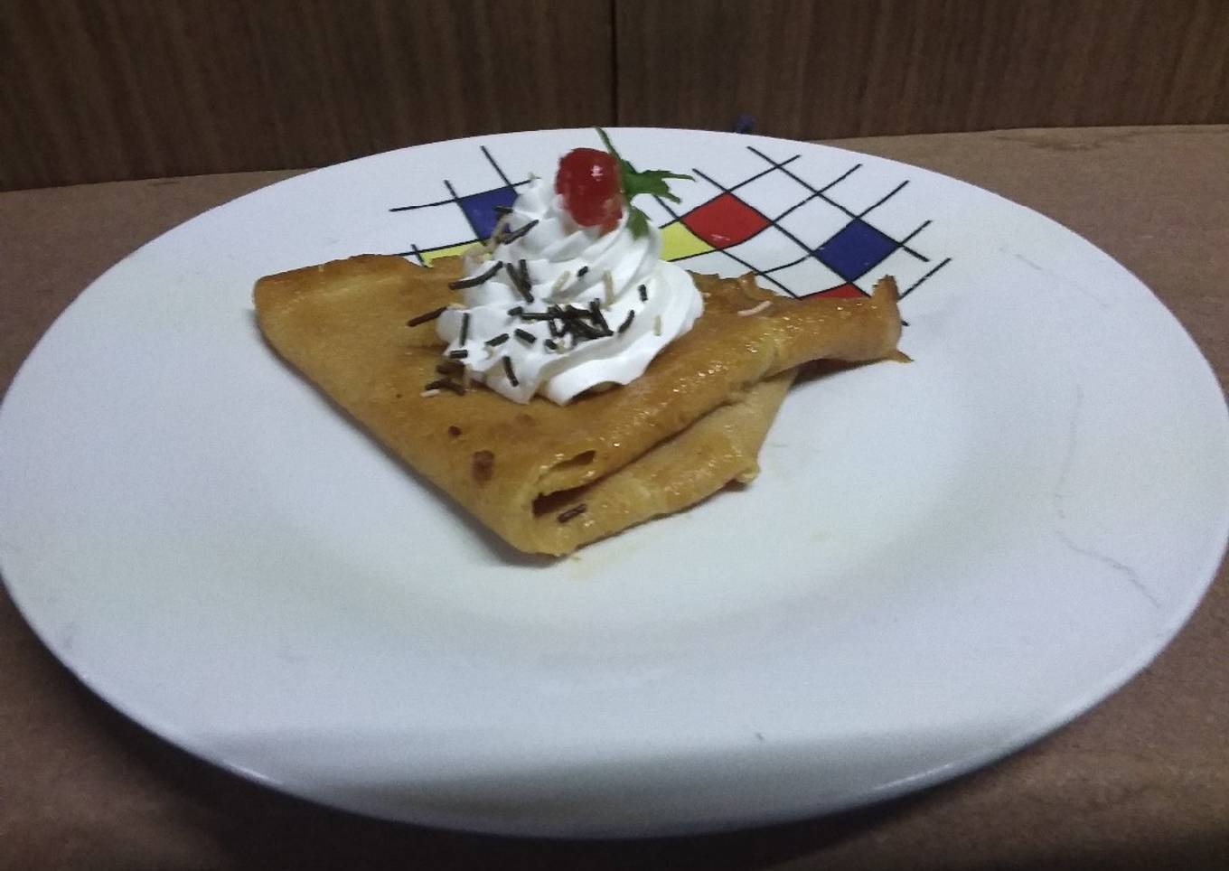 Crepas dulces flameadas con salsa de cajeta