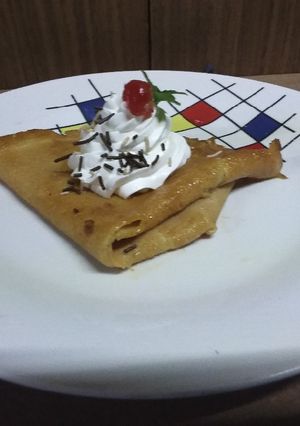Una foto de Crepas dulces flameadas con salsa de cajeta