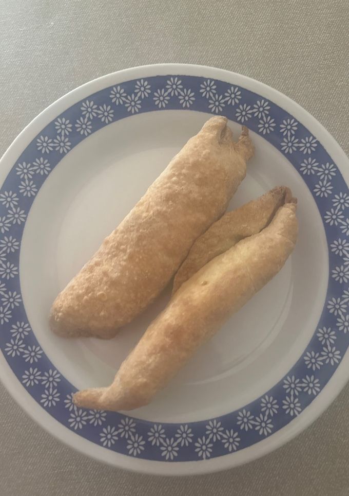 Una foto de Rollizos de queso con masa de orejas