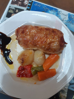 Una foto de Muslos de pollo rellenos de bacon y queso