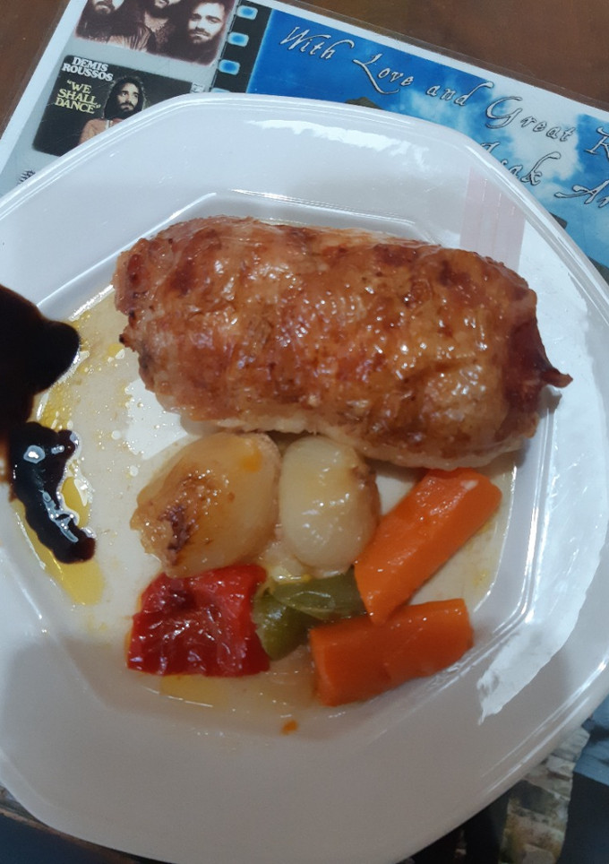 Una foto de Muslos de pollo rellenos de bacon y queso
