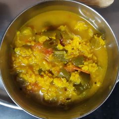 A picture of Snake gourd curry.