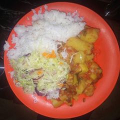 A picture of Rice, Matoke, lemoncabbage.