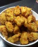 Pollo apanado con cebollín