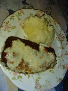 Una foto de Milanesa napolitana