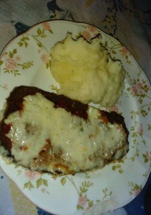 Una foto de Milanesa napolitana