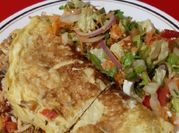 Una foto de omelette pollo