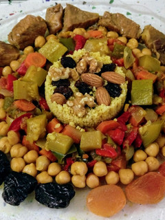 Una foto de Cous-cous ibérico con frutos secos