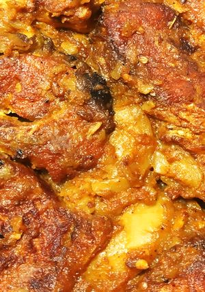 A picture of Bengali style aloo fish curry.