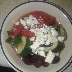 A picture of Summer Tomato, Cucumber, Onion, Garlic, Greek Dressed Feta Salad.