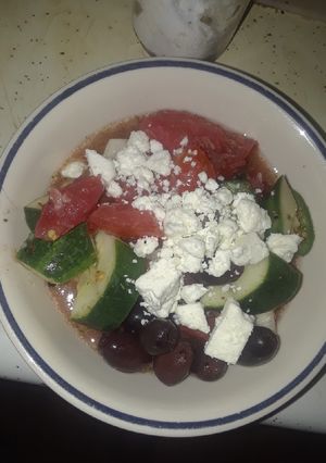 A picture of Summer Tomato, Cucumber, Onion, Garlic, Greek Dressed Feta Salad.